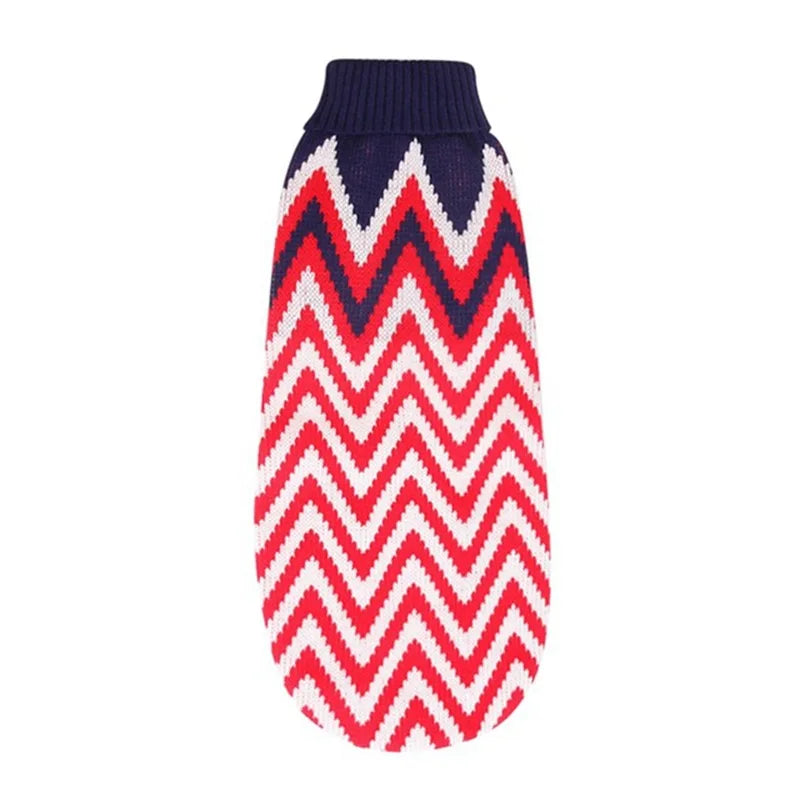 Knitted dog sweater with red, white, and blue chevron pattern on a white background